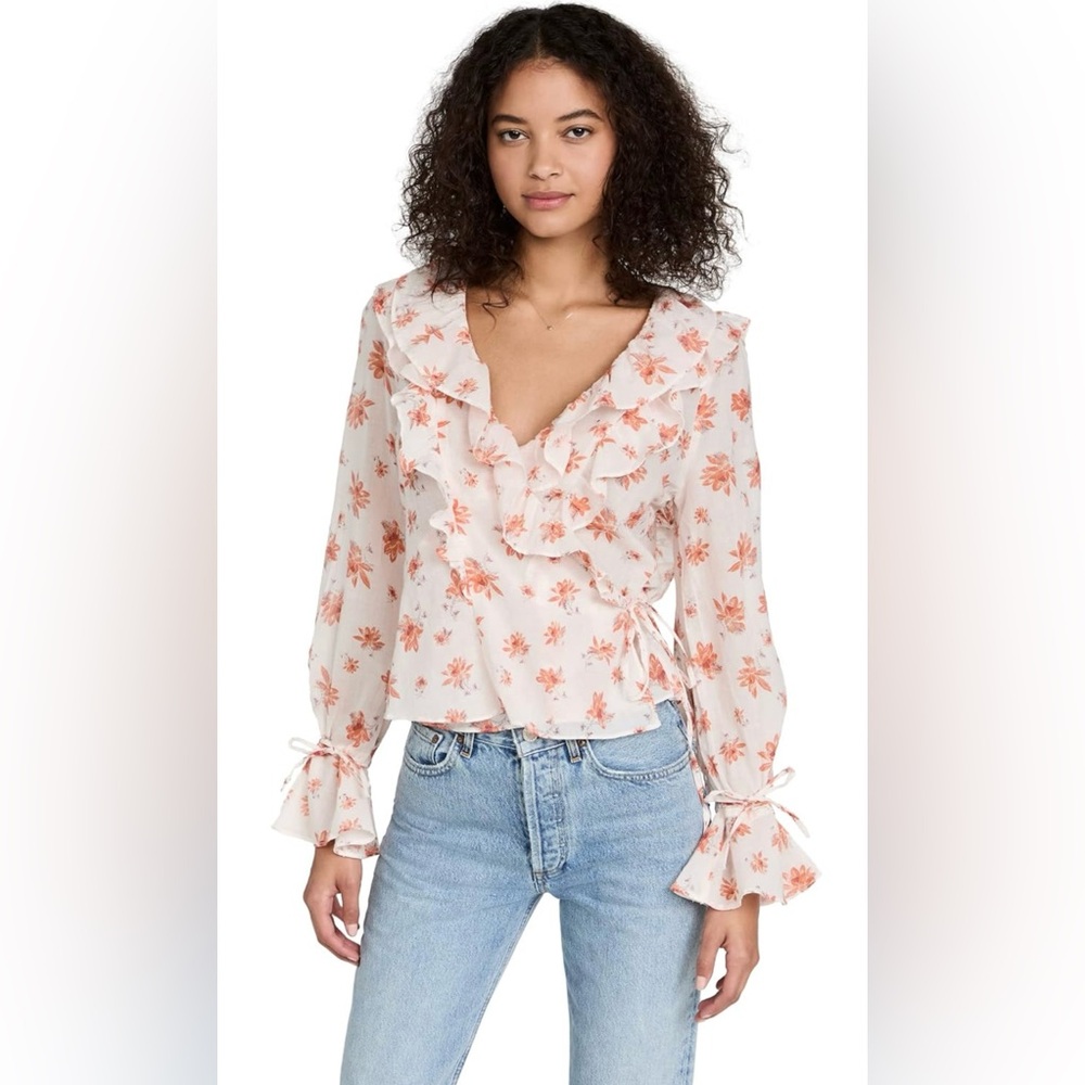 Amanda Ruffle Top in Ivory combo
FREE PEOPLE size Medium %100 cotton
